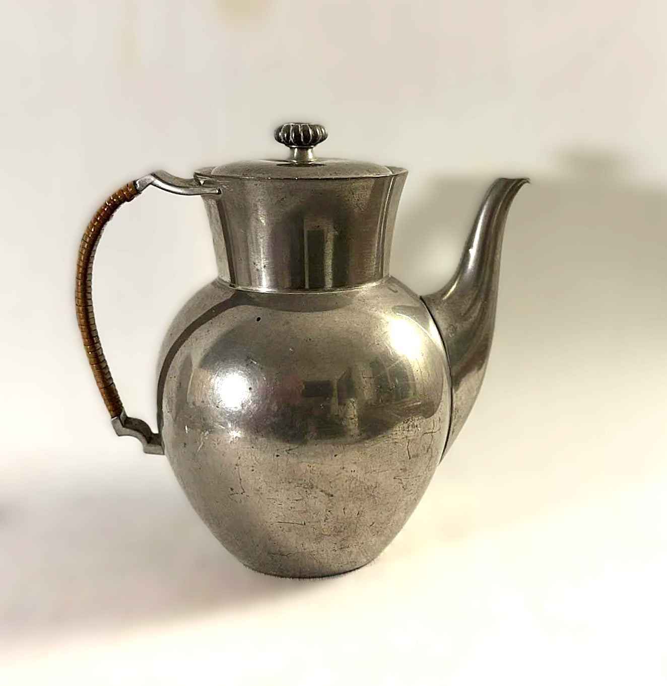 Just Andersen coffee pot with bast handle made of pewter