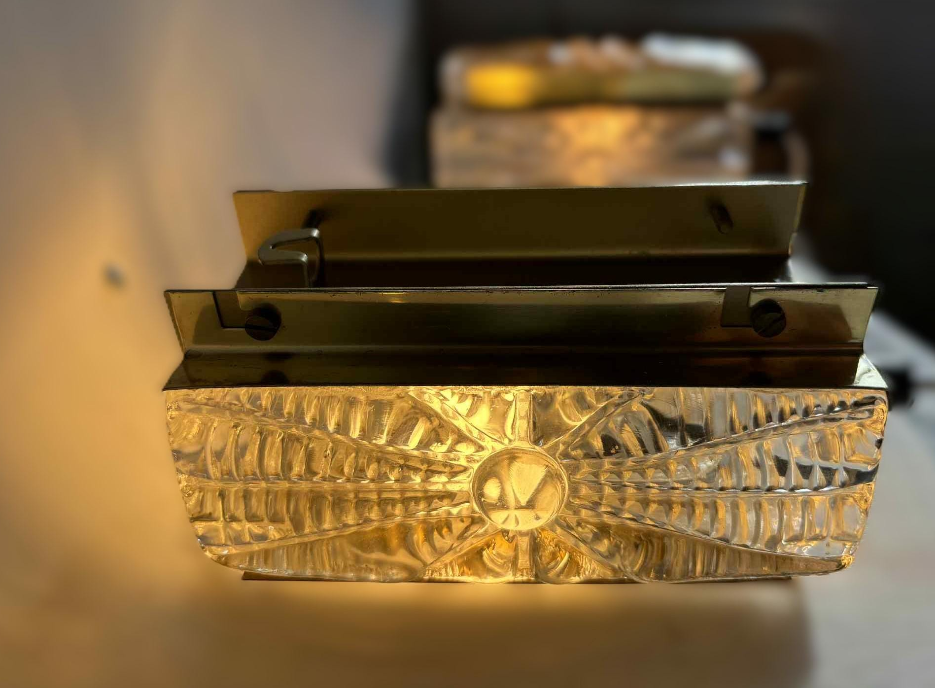 Sconce set Vitrika Aladdin, Brass bases with heavy pressed Amber glass Denmark 1960s