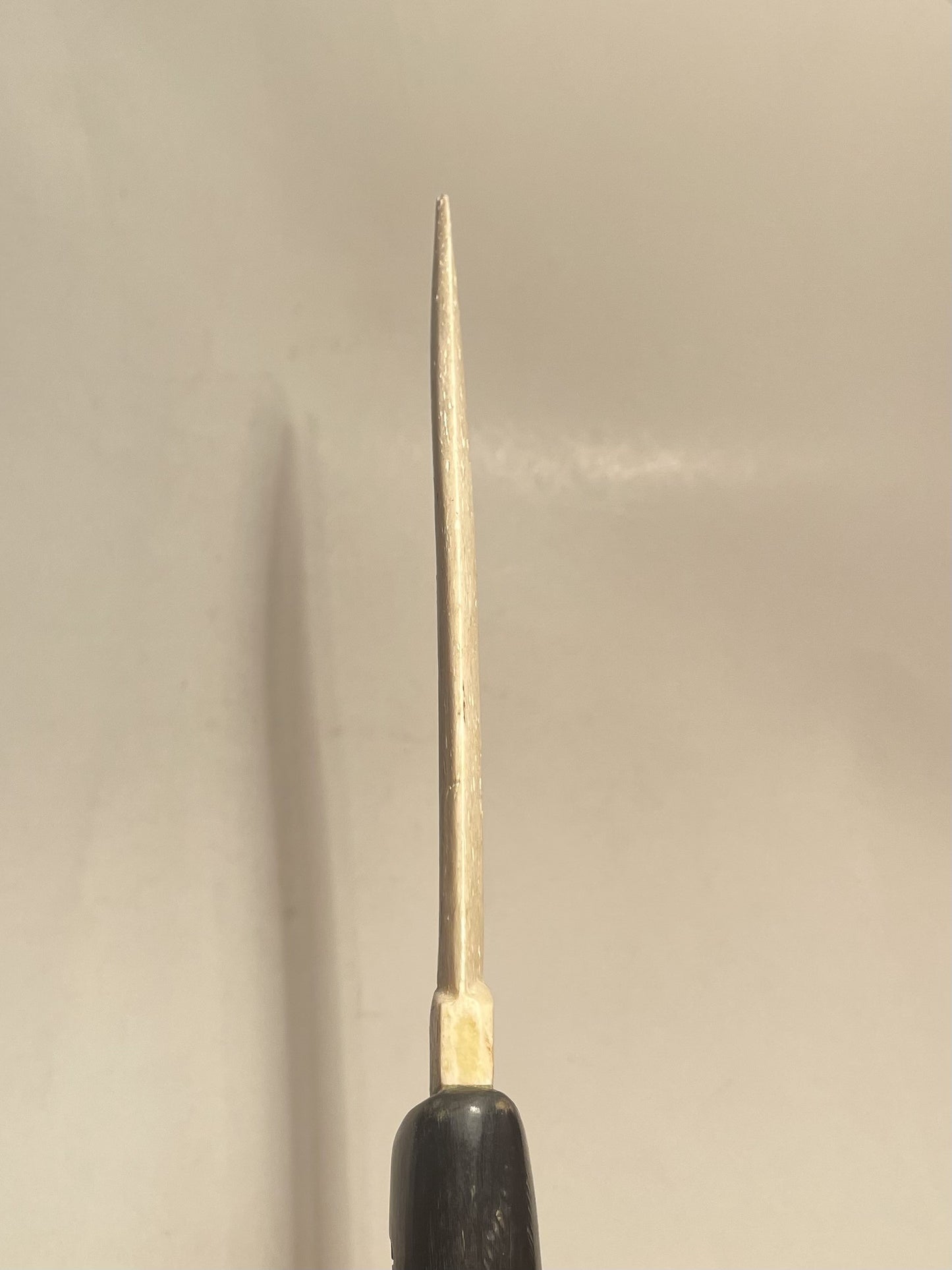 Paper knife with Tupilak handle, carved from buffalo horn and whale rib - no. 09980