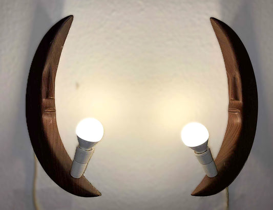 A pair of beautiful teak wall lamps shaped like the moon, Denmark 1970s