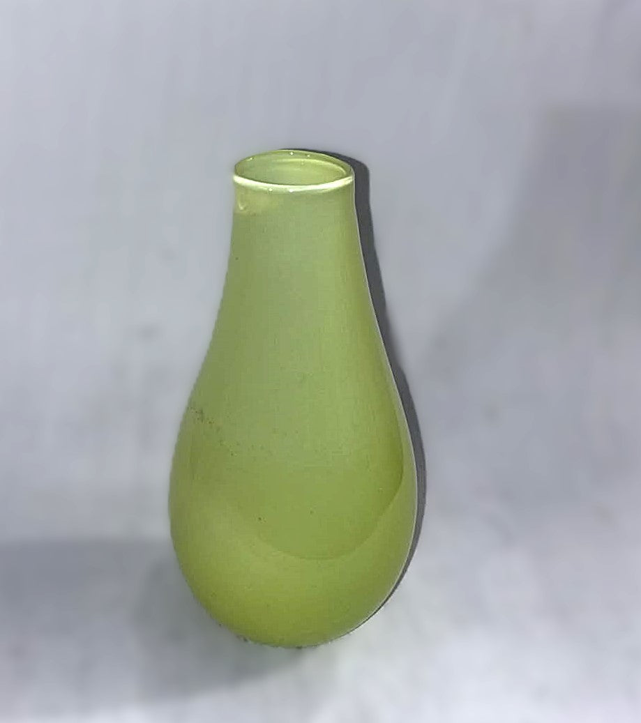 Beautiful characteristic Holmegaard glass vase in lime green, design by Peter Svarre