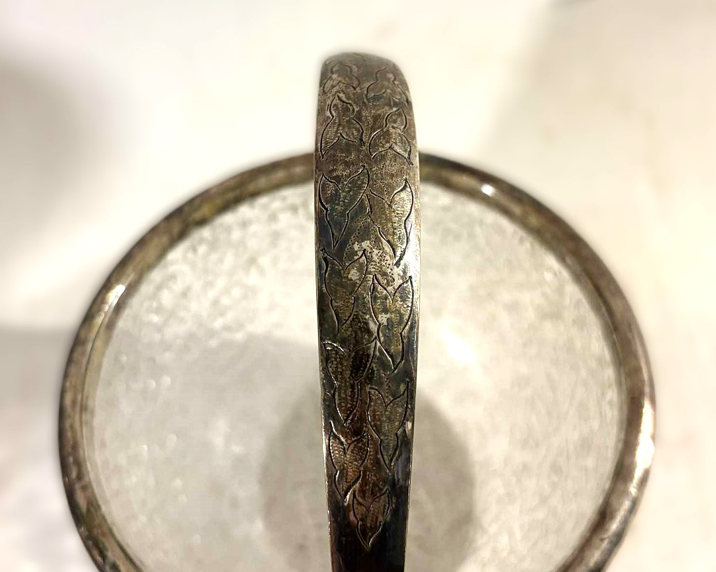 Beautiful old sugar bowl made of cracked glass and with silver plated rim and handle