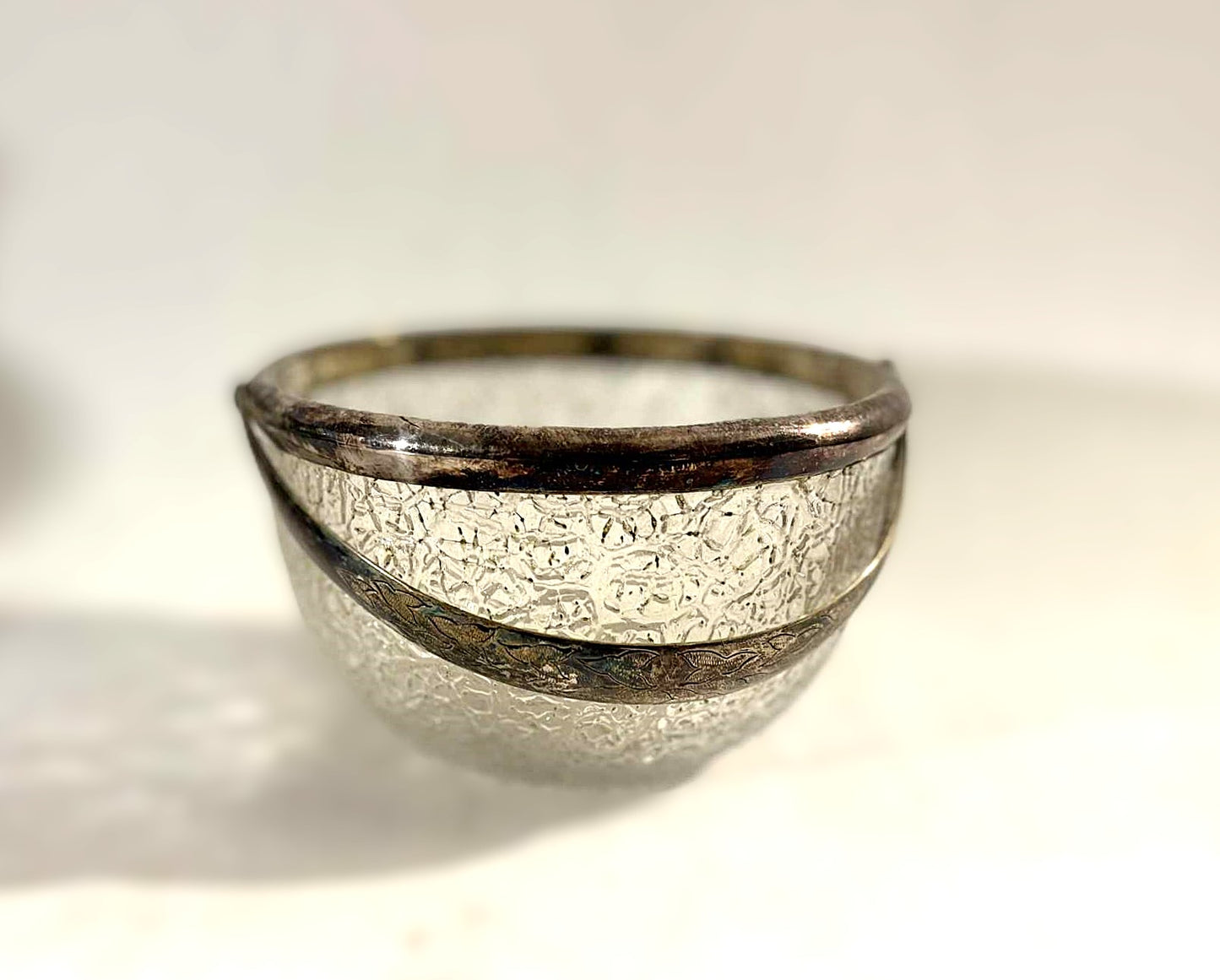 Beautiful old sugar bowl made of cracked glass and with silver plated rim and handle