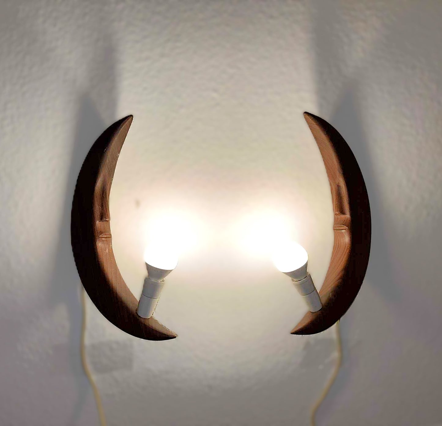 A pair of beautiful teak wall lamps shaped like the moon, Denmark 1970s