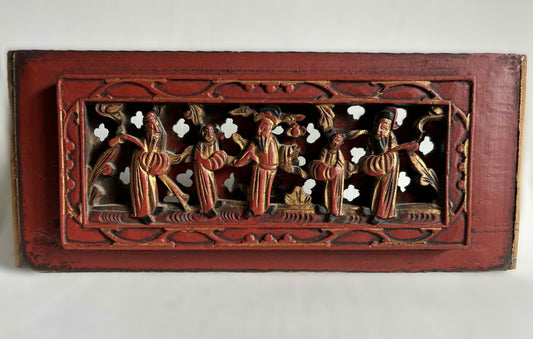 Two Chinese painted and gilded wood richly carved with figures and scenes in panels