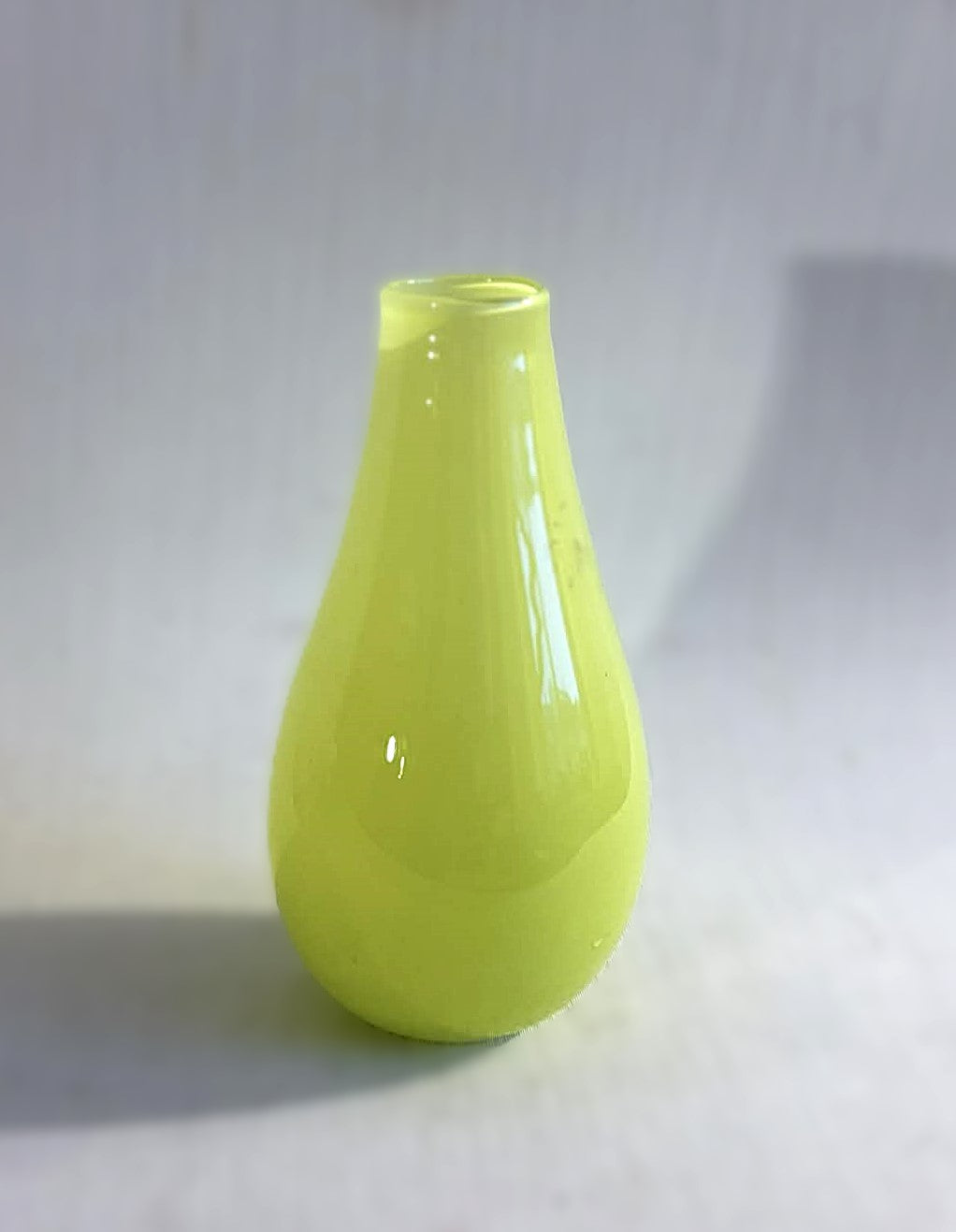 Beautiful characteristic Holmegaard glass vase in lime green, design by Peter Svarre