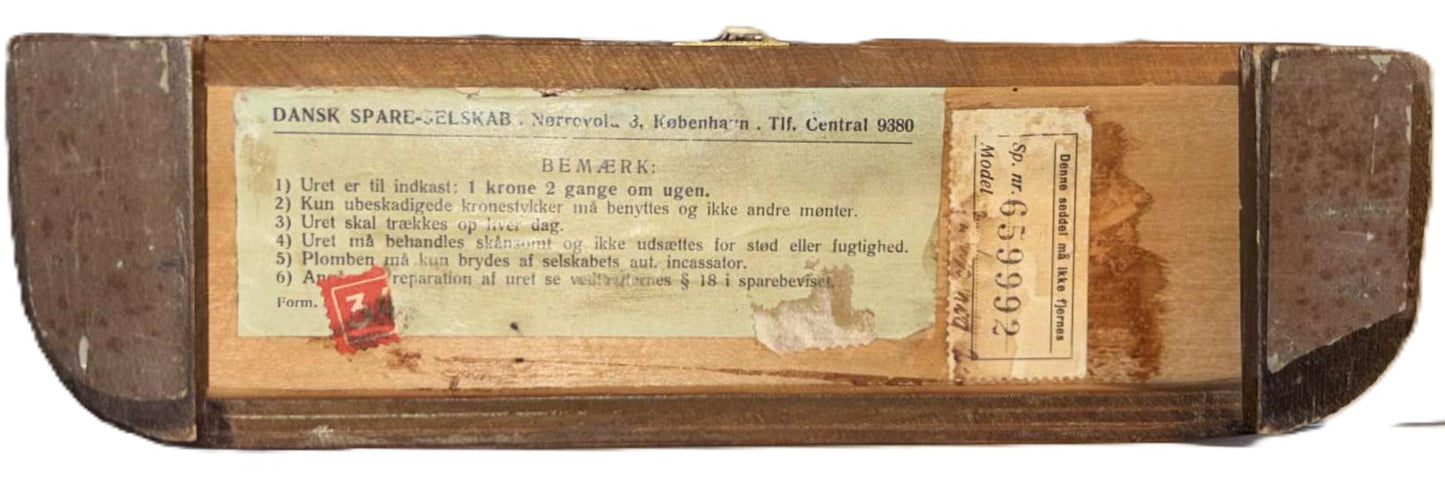 Rare Danish functioning money clock with coin insert from the 1940s-50s