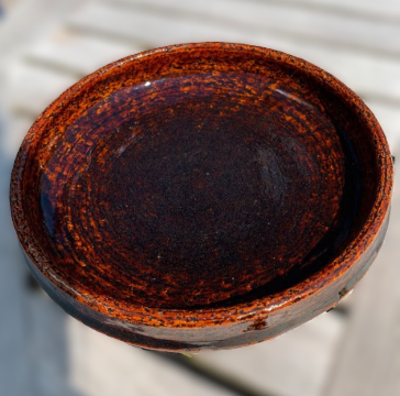A medium and rare glazed stoneware dish from Palshus, Denmark 1960s