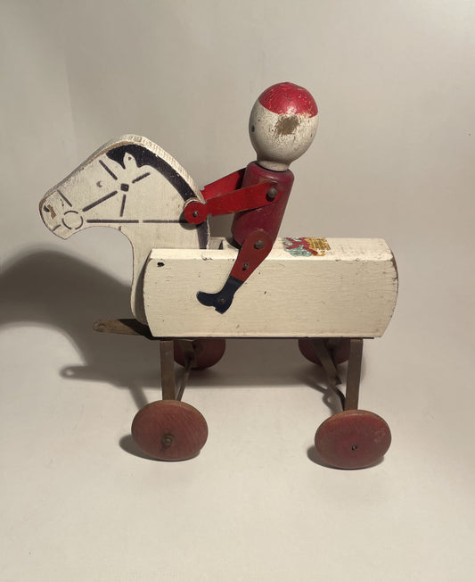 Antique pull toy from Hustler Toy Co. approx. 1920 - No. 09265
