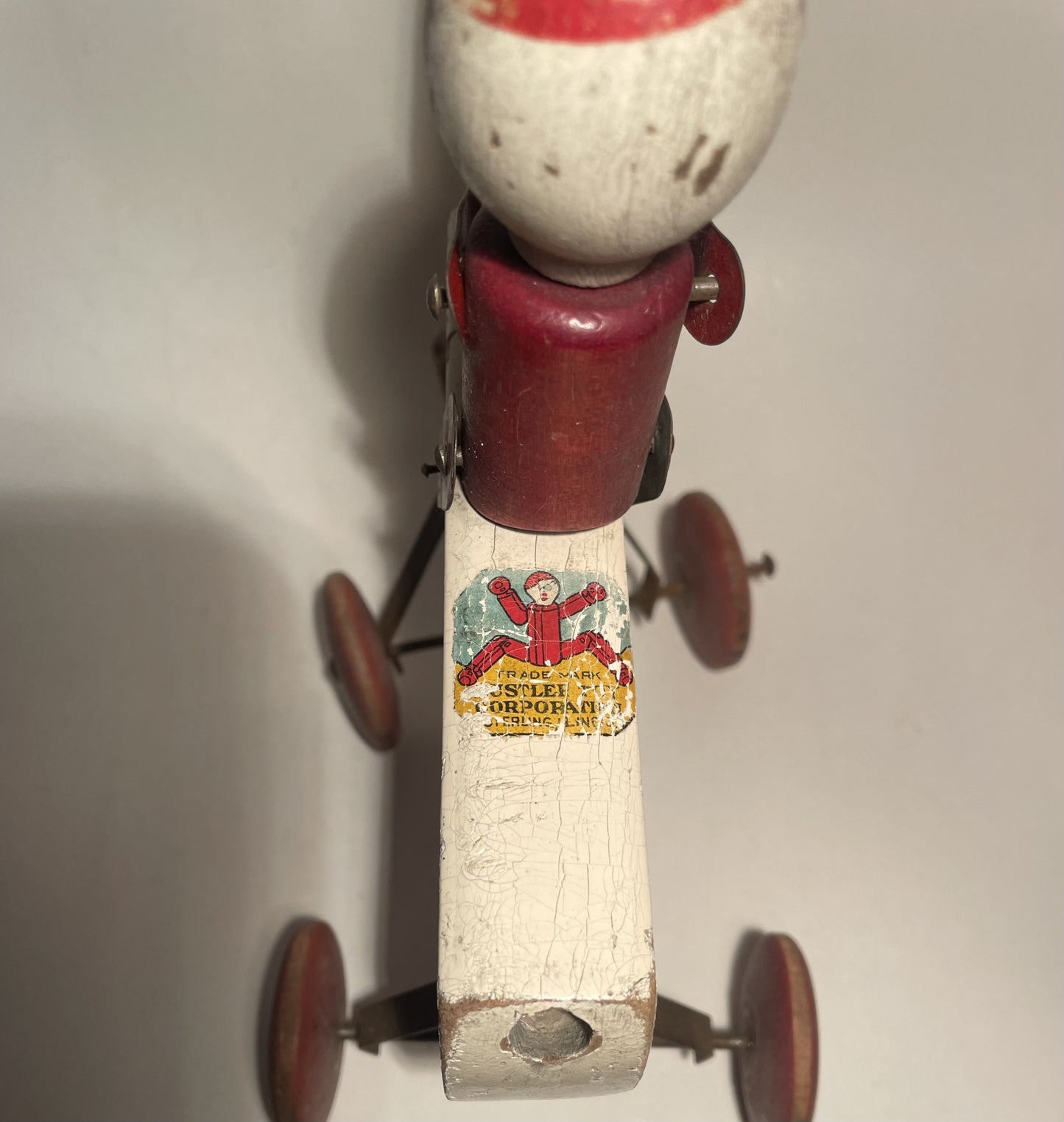 Antique pull toy from Hustler Toy Co. approx. 1920 - No. 09265
