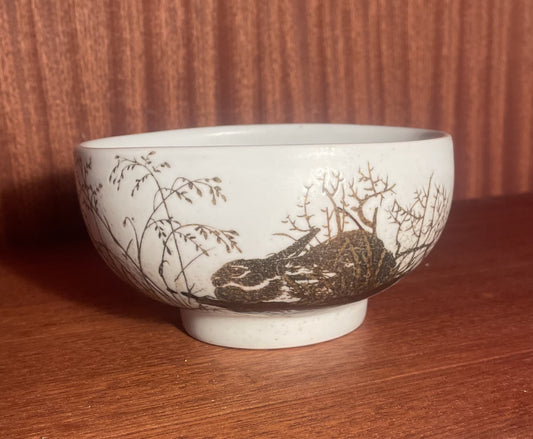 Stoneware bowl with rabbit motifs from Royal Copenhagen, design by Nils Thorsson - no. 02820